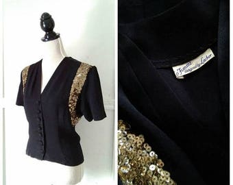 black blouse gold buttons