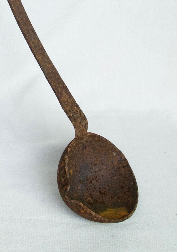 Vintage cast iron ladle...large ladle...rusty ladle.