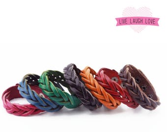 Braided leather bracelet cuff with metal snap closure. Adjustable size. Fresh colors and natural tones. Genuine leather. Ships from US. B012