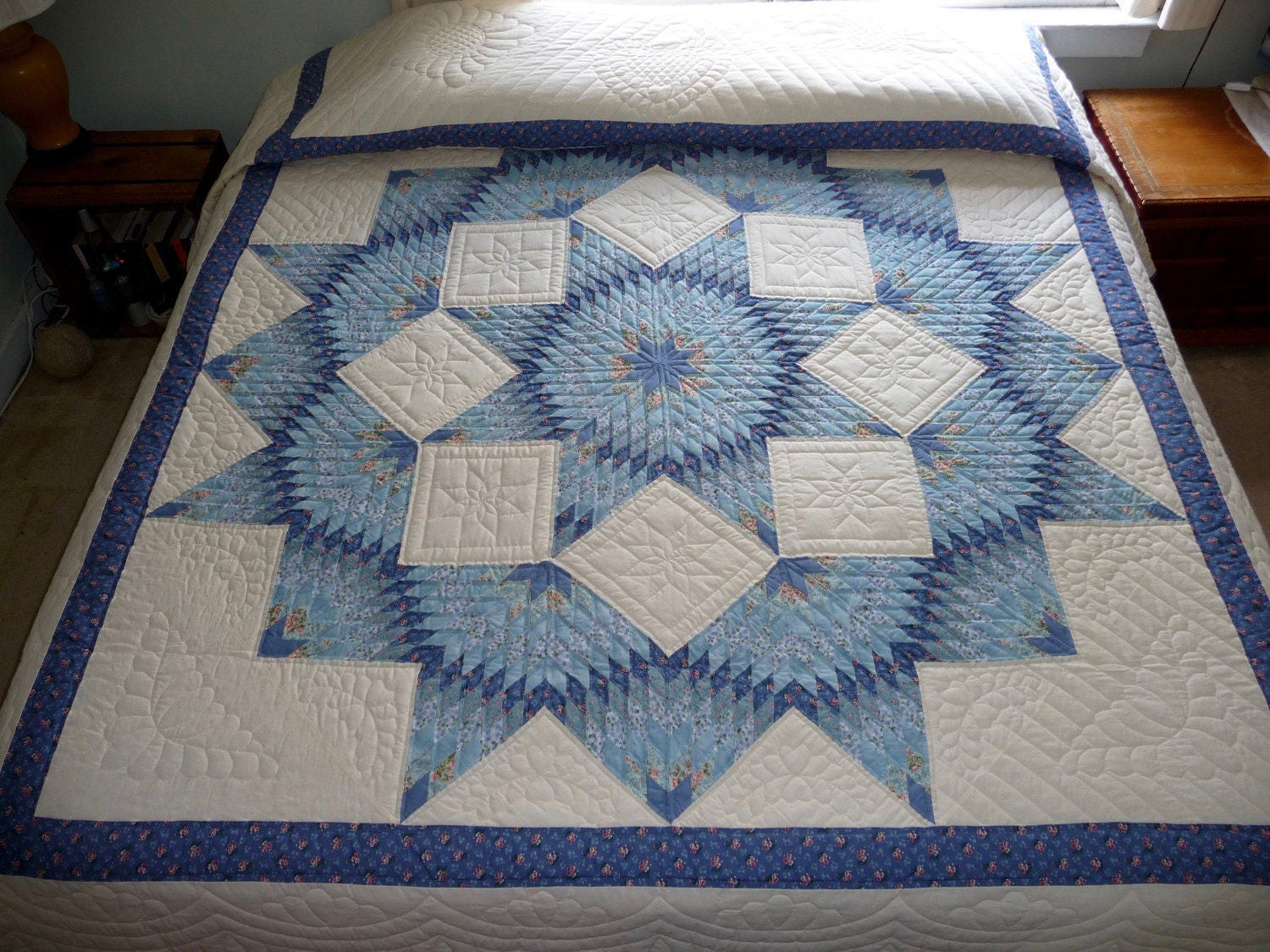 traditional-amish-quilt-broken-star-pattern