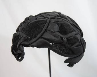 Vintage 1950s 1960s crown cap hat black satin and velvet petals and rosettes