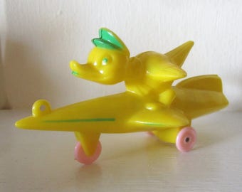 Vintage Hard Plastic Duck on Wheeled Rocket EASTER CANDY CONTAINER - E. Rosen