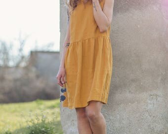 Washed and soft linen dress. Sleeveless linen dress. Relaxed fit soft linen dress with pockets.