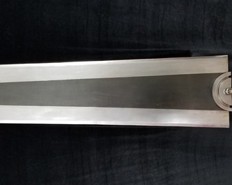 Hardened steel full-scale Dragonslayer, wielded by Guts in the Berserk anime/manga