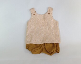Orange pinafore and bloomers