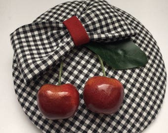 Fascinator with cherries and bow black and white checkered fabric