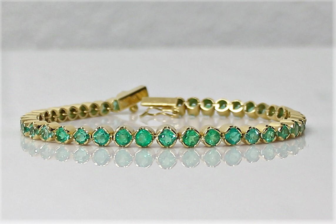 Emeralds tennis bracelet 18Kt Yellow Gold 39 Colombian