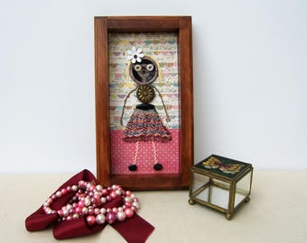 Small unique figurines made of antiques. Wall frame, girl's room.