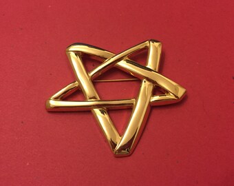 Vintage Gold Star Brooch signed Monet