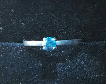 4mm blue diamond and oxidized silver ring. Size 8.