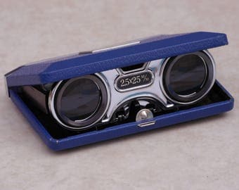 A pair of vintage Japanese 1950s folding opera/sport glasses or binoculars, in original box