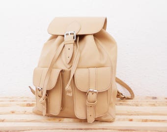 light pink leather backpack