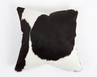 black and white cowhide pillow