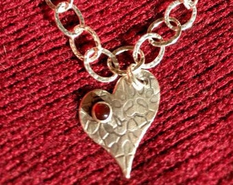 Heart charm sterling silver bracelet with garnet. Handmade.