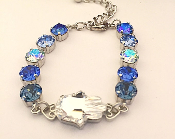 Bohemian Blue Hamsa protection bracelet in an ombre of blue Swarovski crystals. Sapphire blue crystals