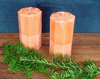 Pair of orange octagon pillar candles