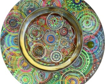 Abstract mixed media painting, metal parts, grommets, small round artwork, 6.5 inches on a wooden panel