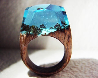 Geppetto Jewelry presents: Game of thrones jewelry. Wood ring "Winterfell". Resin wood ring. Secret world in wooden rings for women & men.