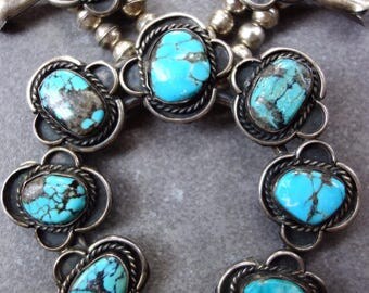 Squash blossom necklace. 166 grams of gorgeous bisbee turquoise and sterling silver. Old pawn! Very old.