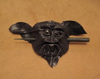 Grichels leather hair thing stick barrette - black with golden brown fish eyes