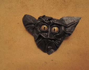 Grichels leather pin/tie tack/brooch - black with green speckled slit pupil reptile eyes