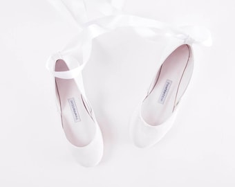the white ribbon ballet flats