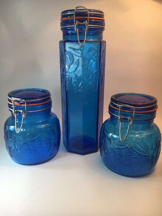 set of 3 blue glass canisters italy