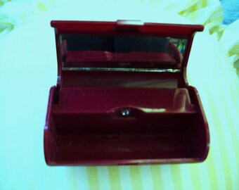 lipstick holder, plastic lipstick case and mirror, burgundy lipstick compact, made in Hong Kong