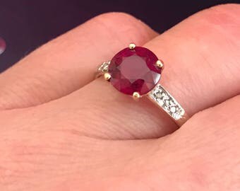 Natural Ruby and Diamond Ring. 14K yellow gold. Offering layaway.