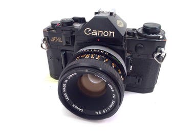 Canon A-1 Black 35mm Film Camera with Canon 50mm Lens