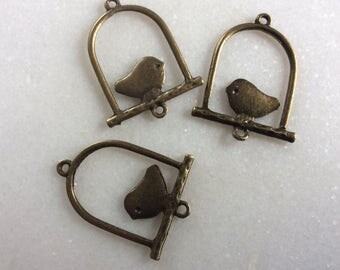 Antique bronze bird stand charm connector