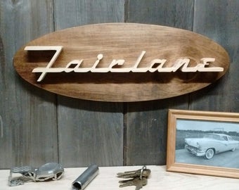 1956 Ford Fairlane Emblem Oval Wall Plaque-Unique scroll saw automotive art created from wood for your garage, shop or man cave.