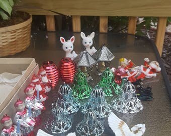 Vintage lot of plastic Christmas ornaments, at least 20 pieces- bells, santas, choir singers and more.