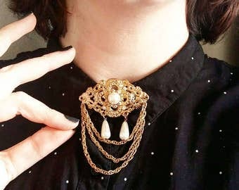 Vintage ornaments brooch, chains gold metal color, rhinestone and faux pearls