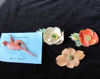 Four Vintage wooden carved Pins