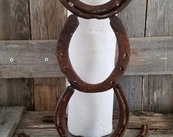 Horseshoe paper towel holder