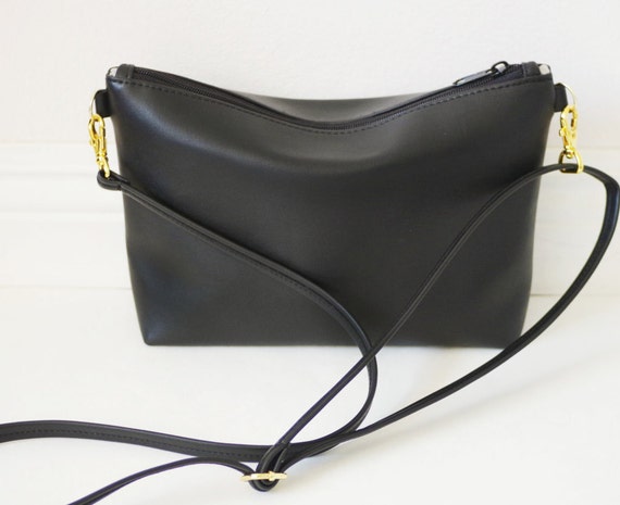 Gold hardware black leather crossbody bag with zipper