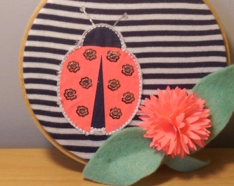 Ladybird garden wall hanging