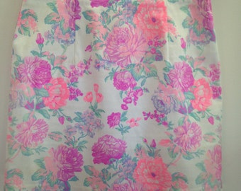 Size 8 size small white floral printed mini skirt pink and purple