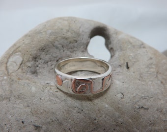 Sterling silver patterned brass ring