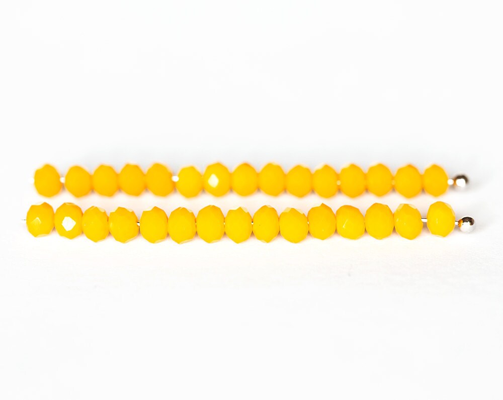 2015_Yellow glass beads 4x3 mm Faceted roundels crystals