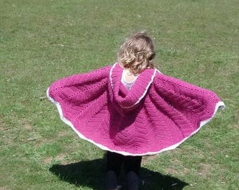 crocheted red riding hood cape.