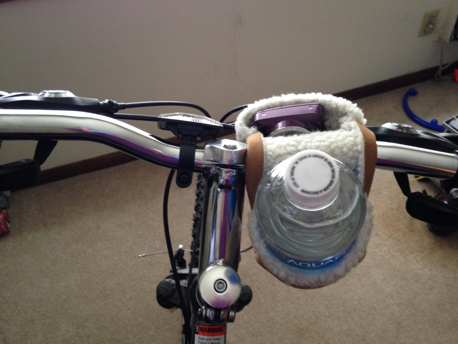 Water bottle and cell phone holder for bike handles