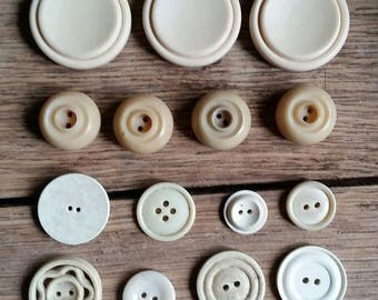 Selection of cream vintage buttons.