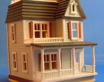 Dollhouse Miniature; 144th scale Miniature Blue House by, Millie August 1981. Item #D252.