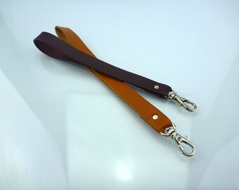 Adding a detachable wristlet strap on your new leather phone case, wrist strap, wristlet strap, leather strap.
