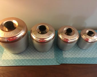 Vintage Aluminum Cannister Set. Copper color lids