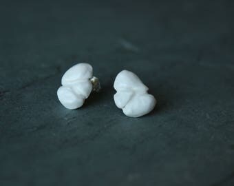 Hand carved porcelain stud earrings