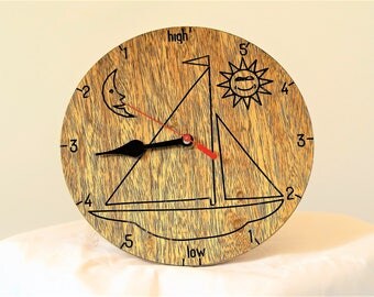 tide clock with anchor or sailing boat design