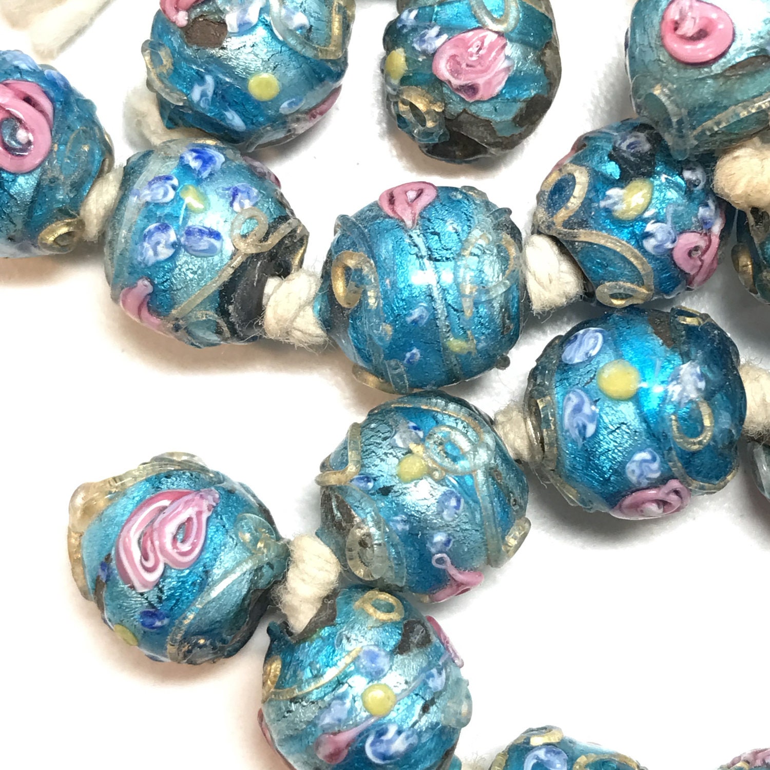 ANTIQUE wedding cake beads. GLASS beads. foil.